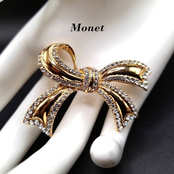 Vintage Monet Rhinestone Bow Brooch, Gold Plated, 1 1/2 Inches - Picture 1 of 9